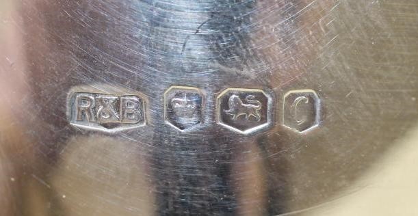 A SILVER PEDESTAL SAUCEBOAT Image