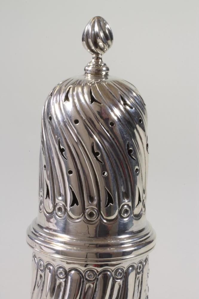 A LATE VICTORIAN SILVER SUGAR CASTOR Image