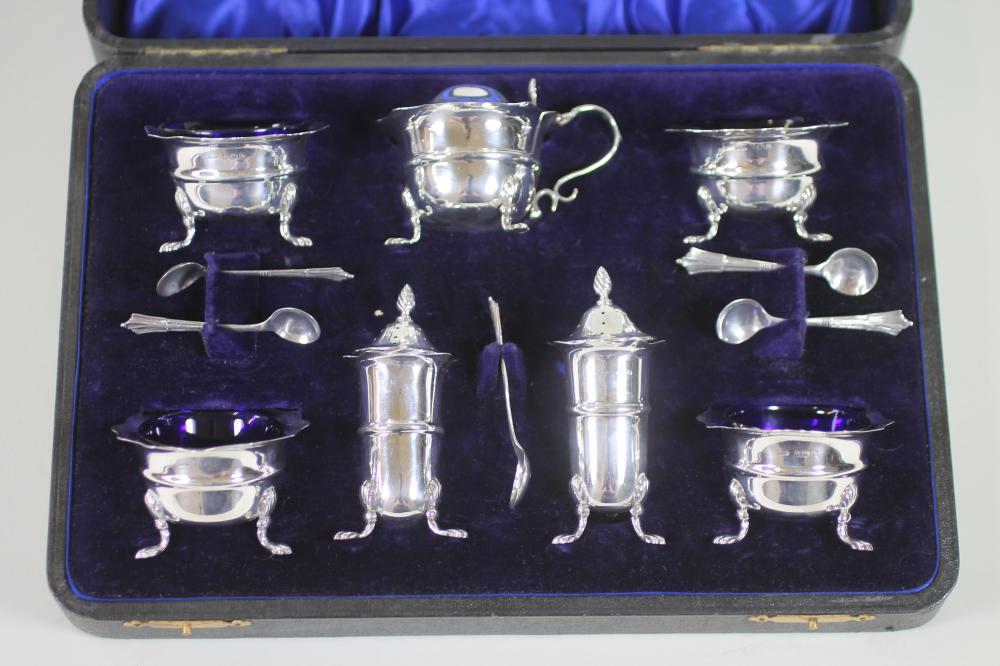 AN EDWARDIAN SILVER SEVEN PIECE CRUET Image