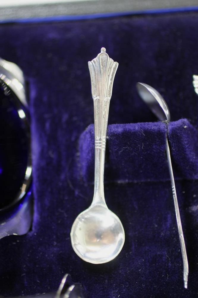 AN EDWARDIAN SILVER SEVEN PIECE CRUET Image