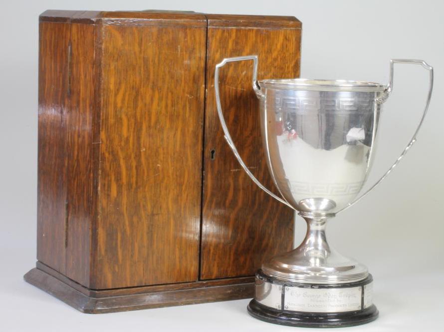 *A LATE GEORGE III SILVER TROPHY CUP Image