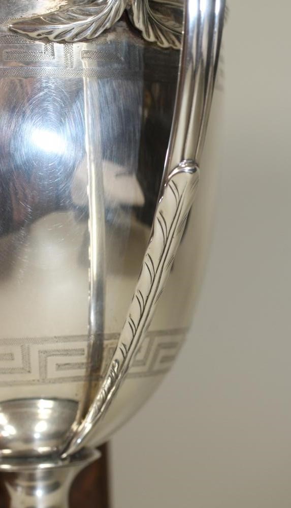 *A LATE GEORGE III SILVER TROPHY CUP Image