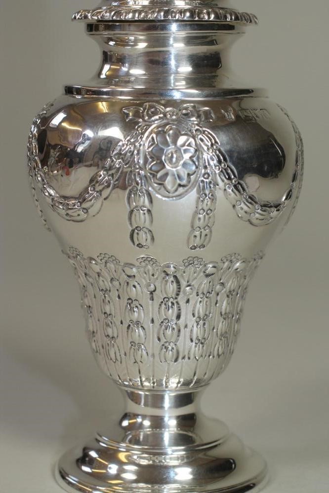 A LATE VICTORIAN SILVER SUGAR CASTOR Image