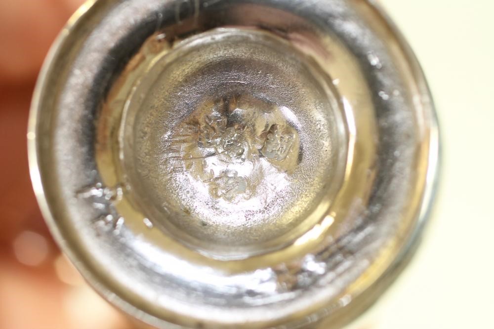 AN EARLY GEORGE II SILVER VASE SHAPED PEPPERETTE Image