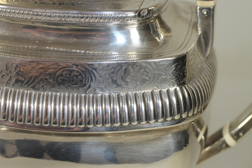 *A LATE GEORGE III SILVER TEAPOT Image