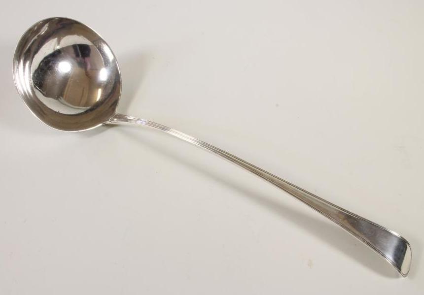 A GEORGE III SILVER SOUP LADLE Image