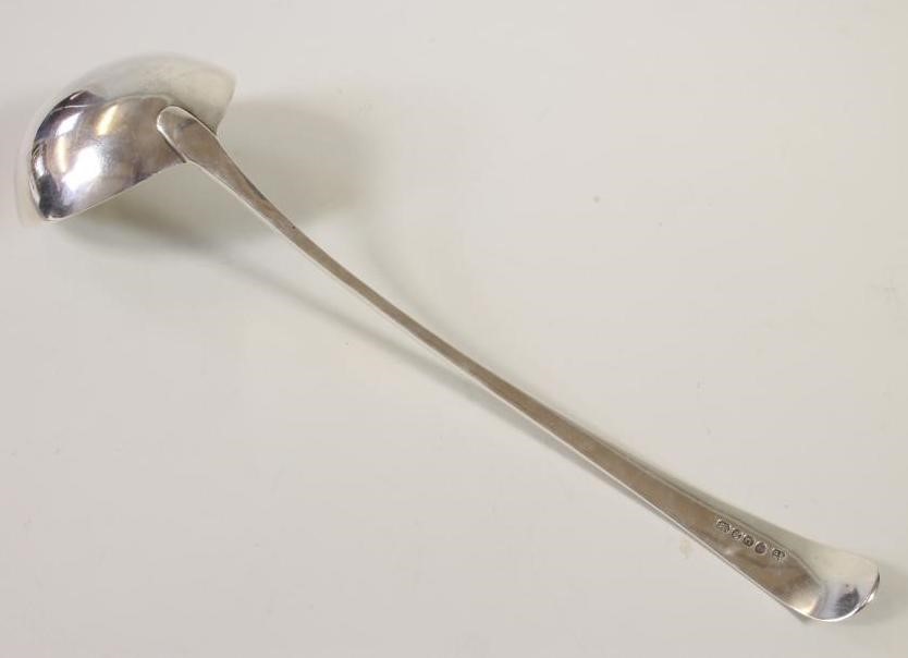 A GEORGE III SILVER SOUP LADLE Image