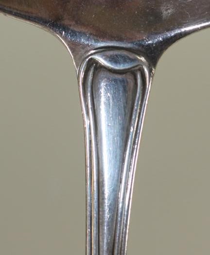 A GEORGE III SILVER SOUP LADLE Image