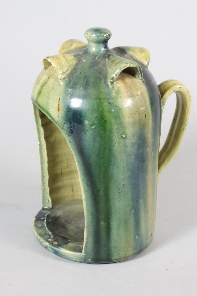 A SCOTTISH EARTHENWARE CANDLE HOLDER Image