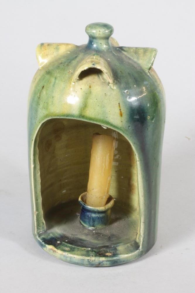 A SCOTTISH EARTHENWARE CANDLE HOLDER Image