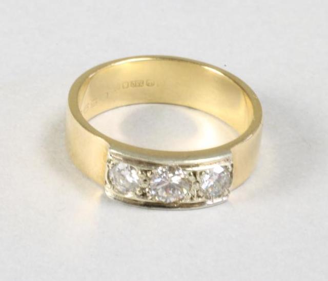 A THREE STONE DIAMOND RING Image