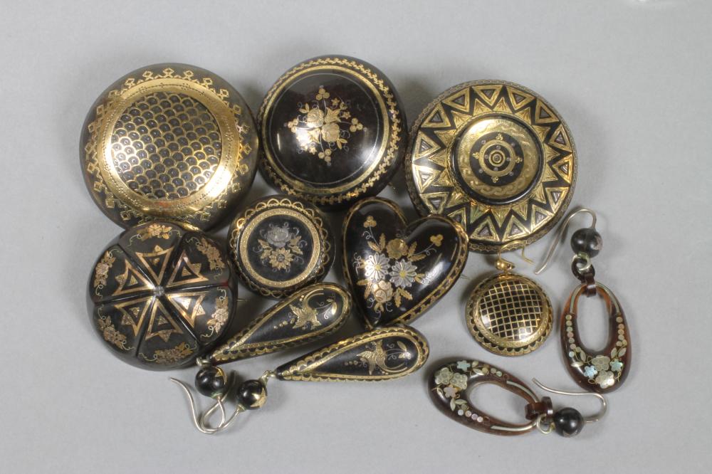 A COLLECTION OF VICTORIAN TORTOISESHELL PIQUE WORK JEWELLERY comprising six brooches and three pairs Image