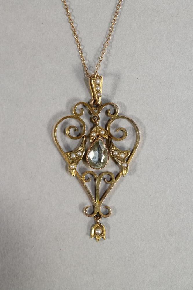 A LATE VICTORIAN 15CT GOLD WIREWORK PENDANT Image