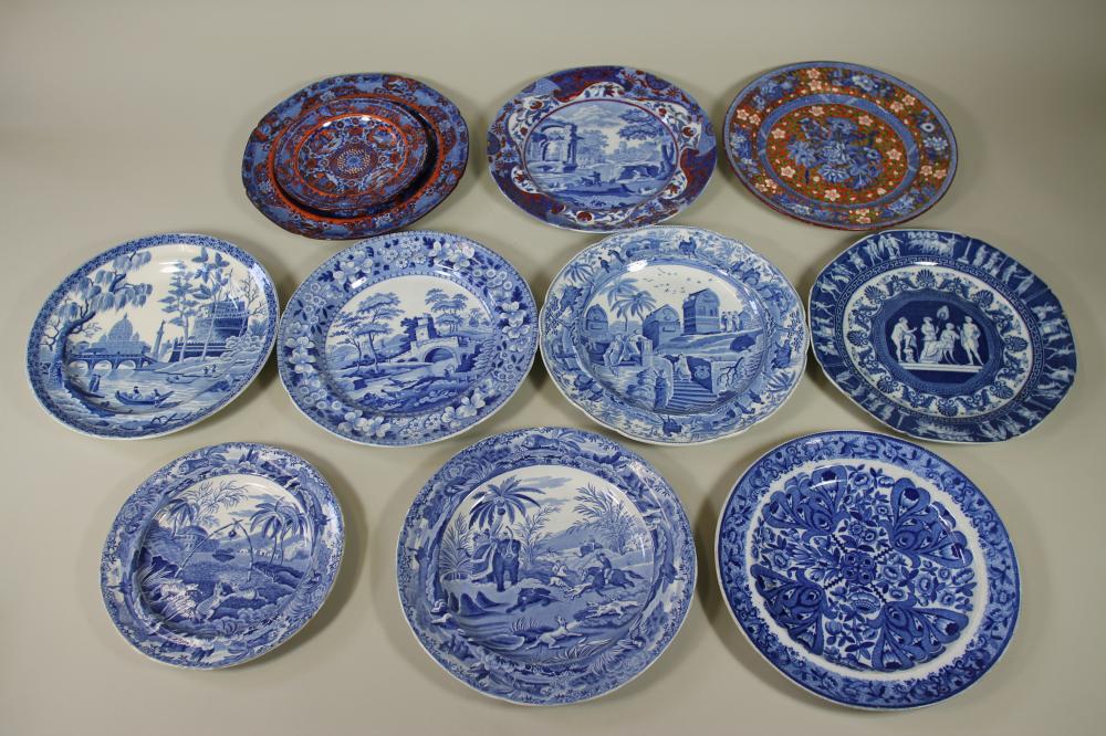 A COLLECTION OF TWELVE SPODE BLUE AND WHITE PRINTED EARTHENWARE PLATES Image