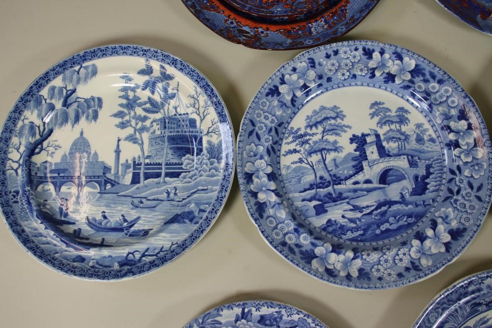 A COLLECTION OF TWELVE SPODE BLUE AND WHITE PRINTED EARTHENWARE PLATES Image