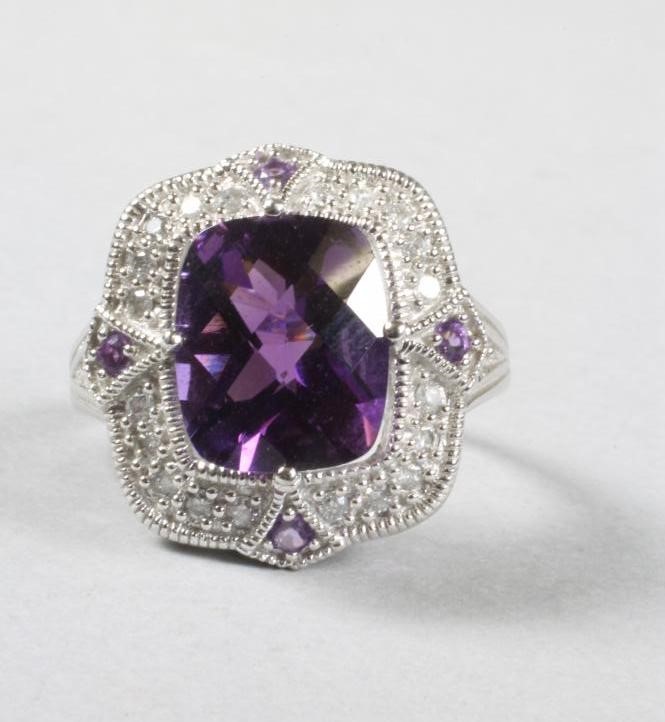 AN AMETHYST AND DIAMOND COCKTAIL RING Image
