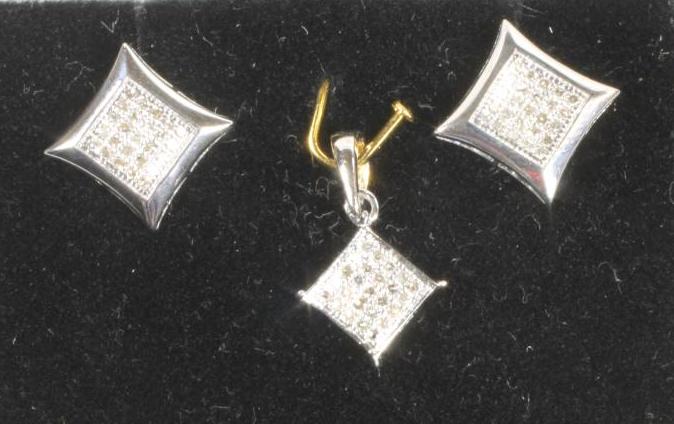 A DIAMOND SUITE comprising a pair of ear studs of square cushion form centrally millegrain set with Image