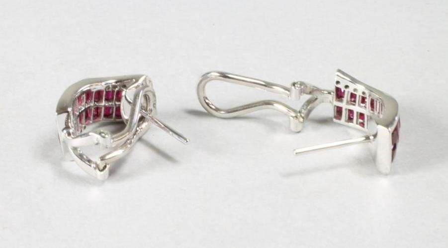 A PAIR OF RUBY AND DIAMOND EAR STUDS Image