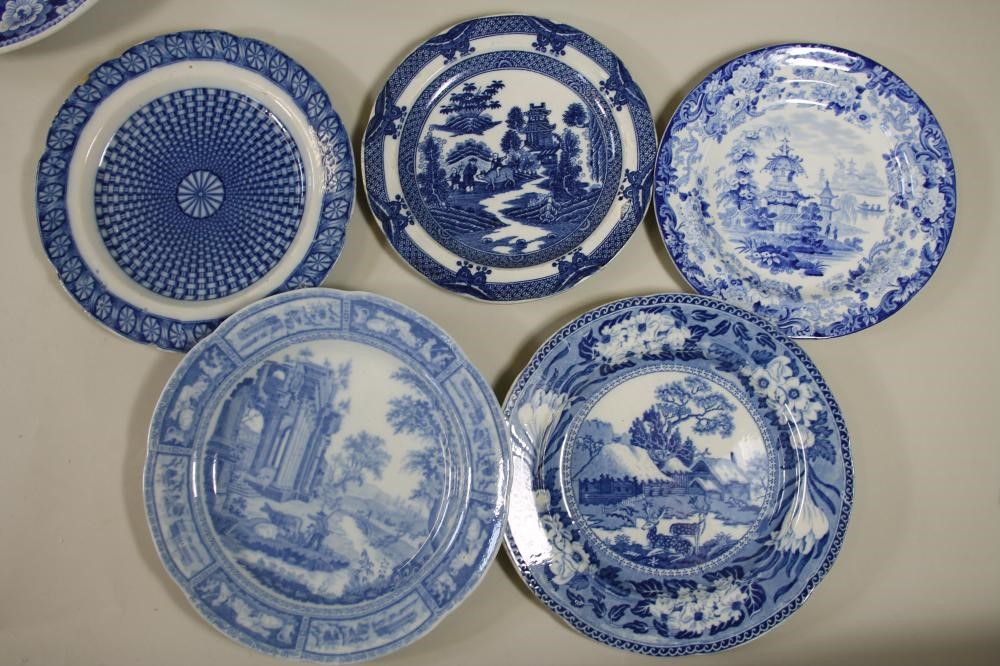 A COLLECTION OF SEVENTEEN WEDGWOOD AND OTHER BLUE AND WHITE PRINTED EARTHENWARE PLATES Image