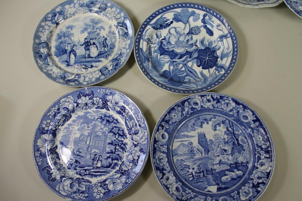 A COLLECTION OF SEVENTEEN WEDGWOOD AND OTHER BLUE AND WHITE PRINTED EARTHENWARE PLATES Image