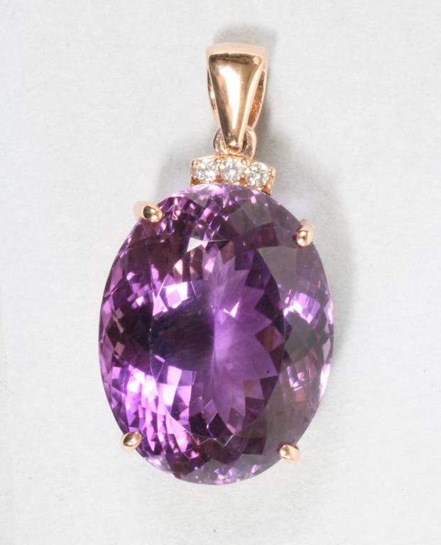 A LARGE AMETHYST PENDANT Image