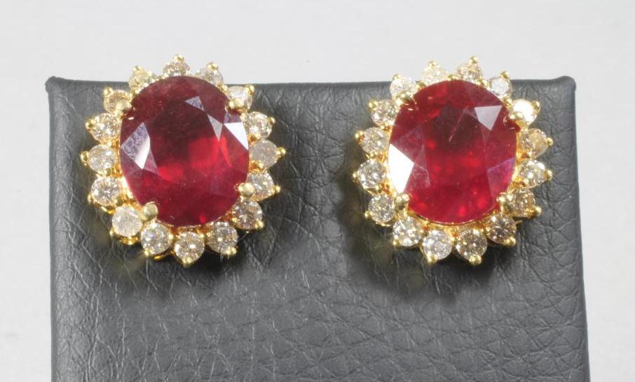 A PAIR OF RUBY AND DIAMOND EAR STUDS Image
