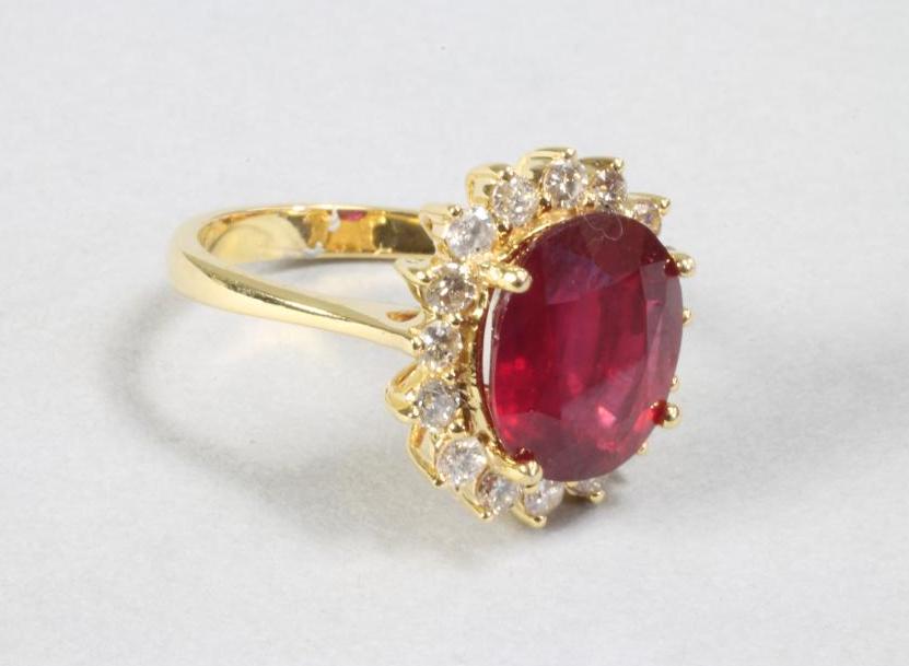 A RUBY AND DIAMOND RING to match the previous lot Image