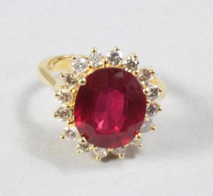A RUBY AND DIAMOND RING to match the previous lot Image