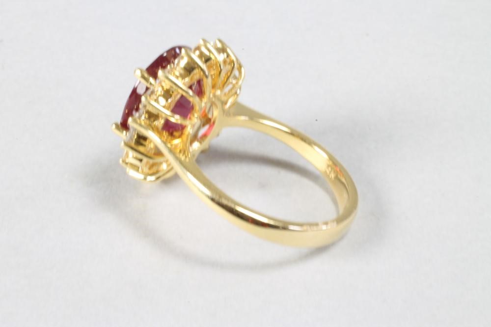 A RUBY AND DIAMOND RING to match the previous lot Image