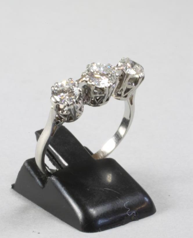 A THREE STONE DIAMOND RING Image