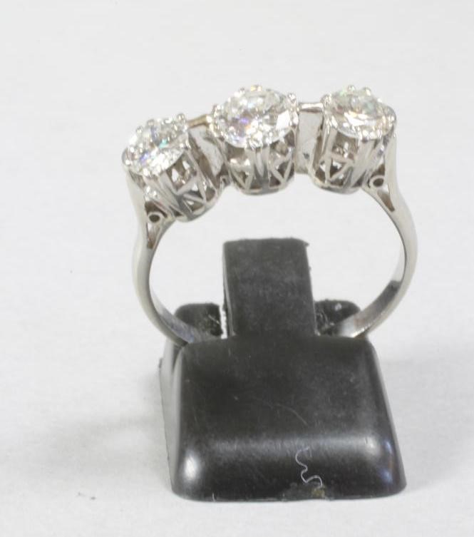 A THREE STONE DIAMOND RING Image