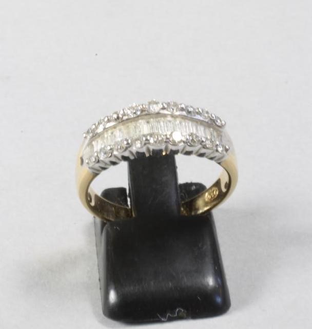 A DIAMOND HALF HOOP ETERNITY RING Image