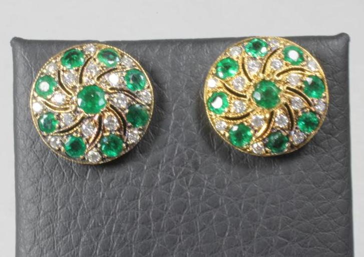 A PAIR OF EMERALD AND DIAMOND EAR STUDS Image