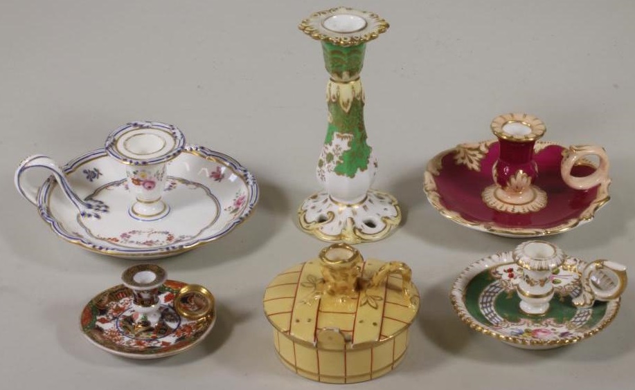 A COLLECTION OF FIVE REGENCY AND LATER PORCELAIN CHAMBERSTICKS Image