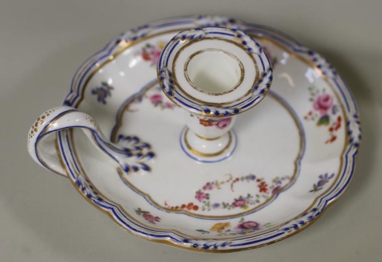 A COLLECTION OF FIVE REGENCY AND LATER PORCELAIN CHAMBERSTICKS Image