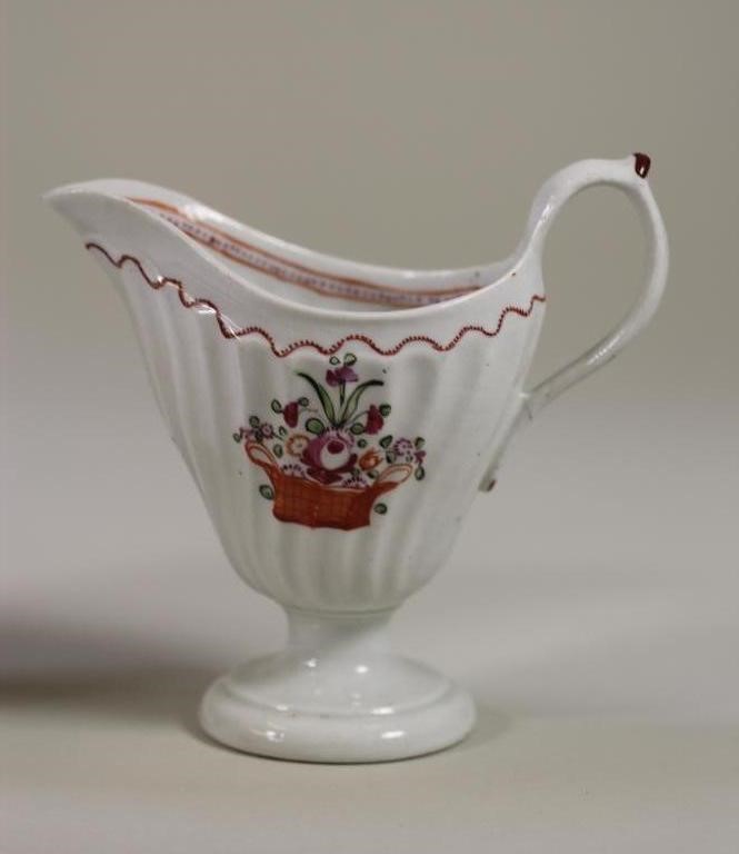 FOUR ENGLISH PORCELAIN JUGS Image