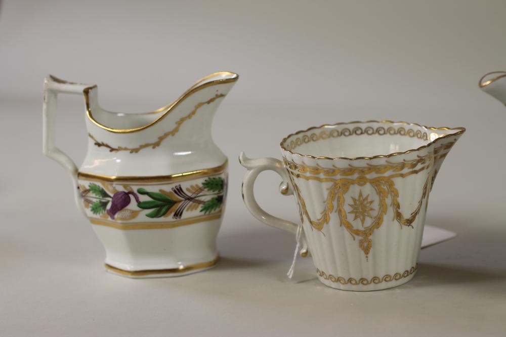 FOUR ENGLISH PORCELAIN JUGS Image