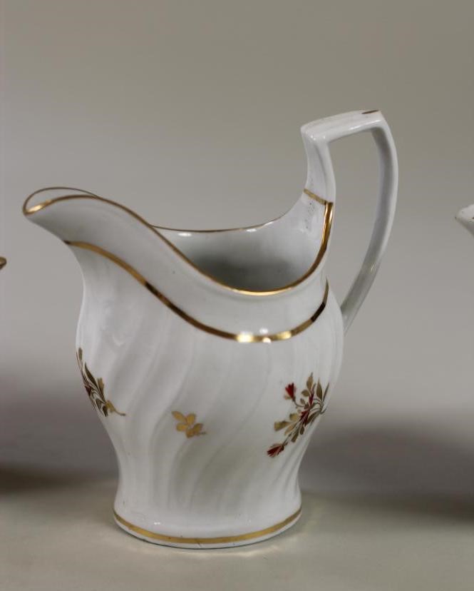 FOUR ENGLISH PORCELAIN JUGS Image