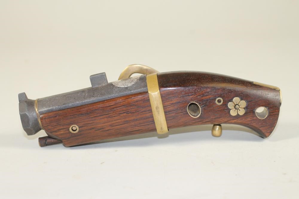 A LATE EDO PERIOD NETSUKI TEPPO MATCHLOCK PISTOL Image