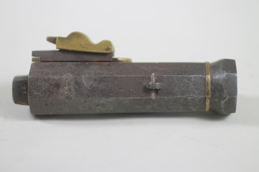 A LATE EDO PERIOD NETSUKI TEPPO MATCHLOCK PISTOL Image