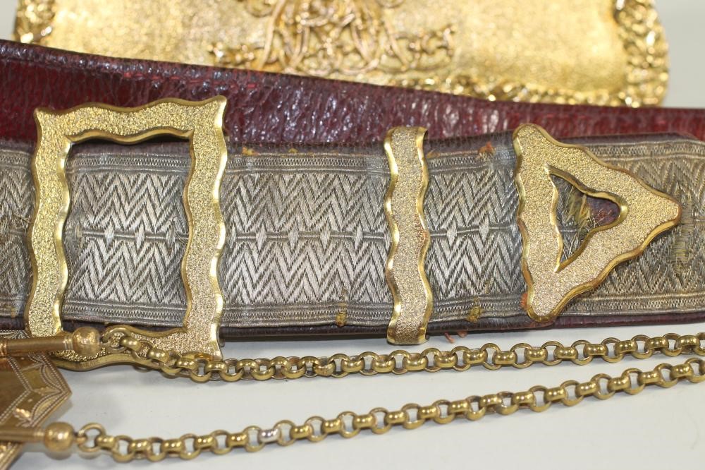A VICTORIAN 9TH QUEEN'S LANCER OFFICER'S CARTOUCHE POUCH AND BELT Image