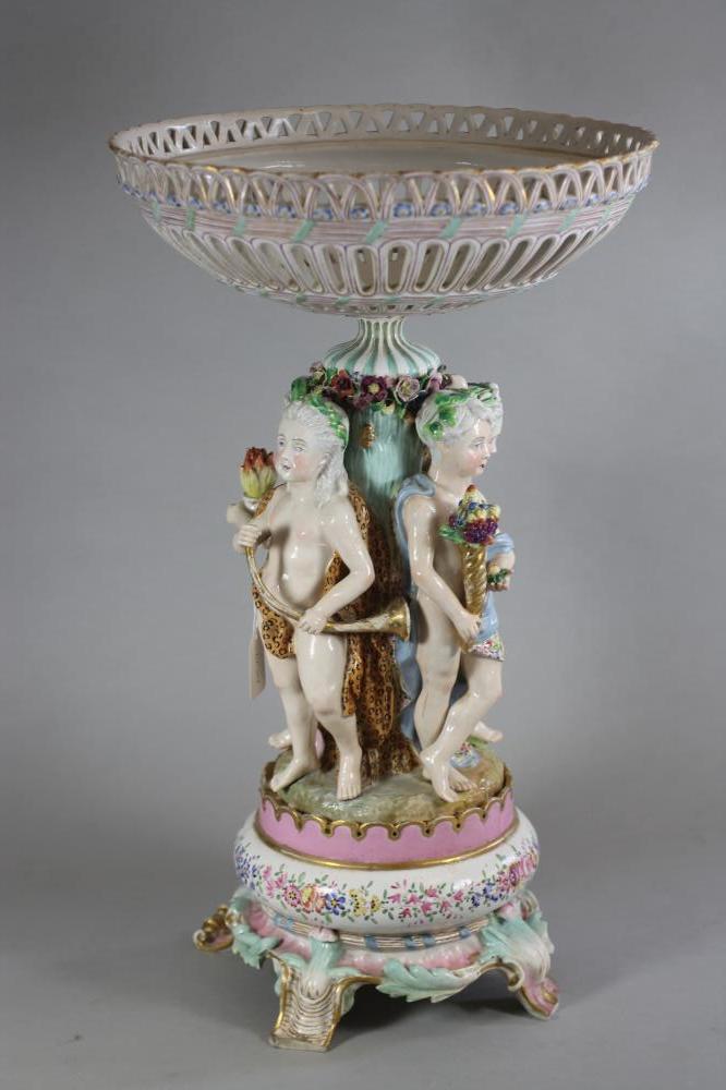 A LARGE GERMAN PORCELAIN FIGURAL TABLE CENTEPIECE Image