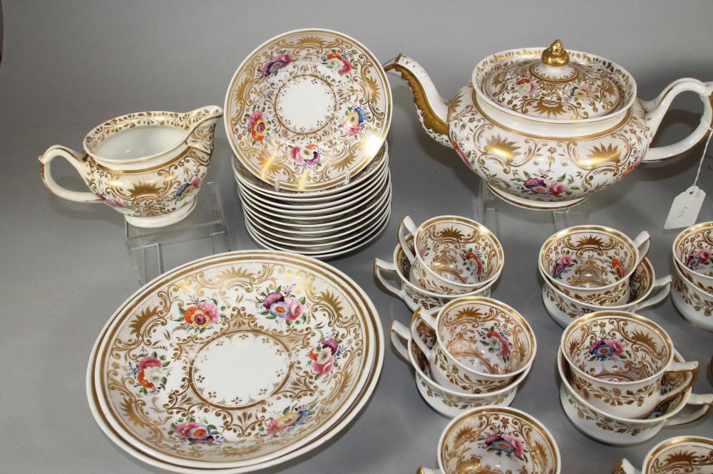 AN ENGLISH PORCELAIN PART TEA AND COFFEE SERVICE Image