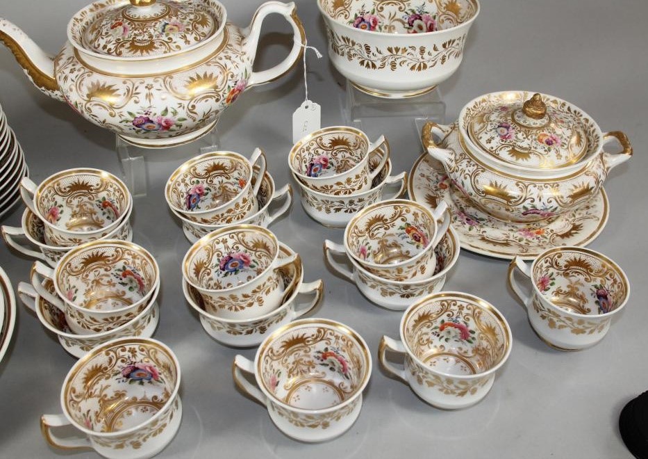 AN ENGLISH PORCELAIN PART TEA AND COFFEE SERVICE Image