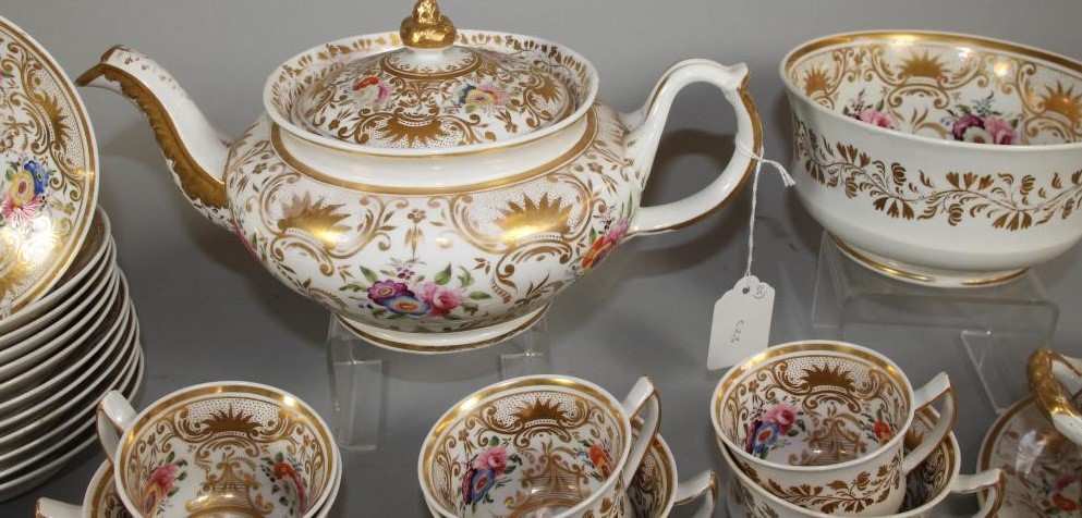 AN ENGLISH PORCELAIN PART TEA AND COFFEE SERVICE Image