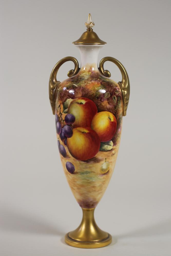 A ROYAL WORCESTER CHINA VASE AND COVER Image