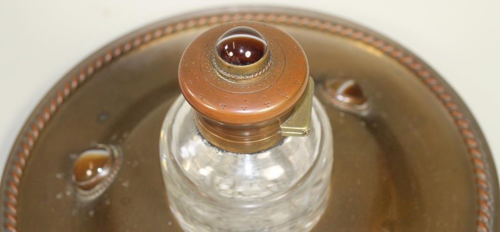 A VICTORIAN GOTHIC REVIVAL MATCHED FOUR PIECE DESK SET in copper and brass Image