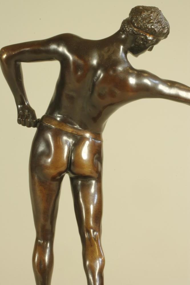 A BRONZE FIGURE OF A MALE NUDE Image