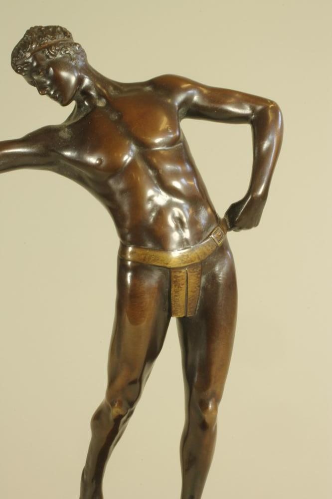 A BRONZE FIGURE OF A MALE NUDE Image