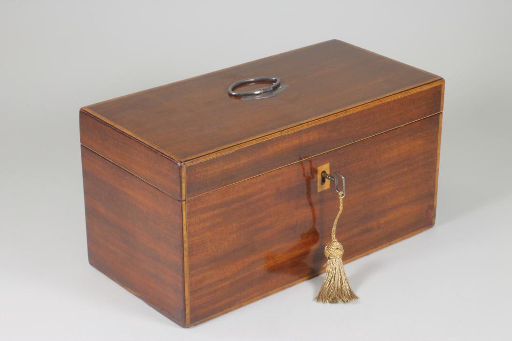 A LATE GEORGE III MAHOGANY TEA CADDY of plain oblong form with satinwood and ebony stringing Image